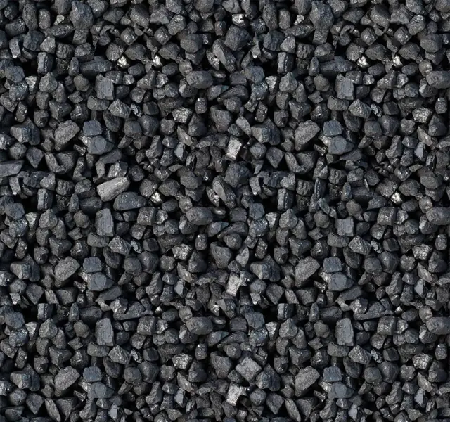 Large-format slabs of graphite-black granite are split by hand directly at the quarry: the texture of each slab and the pattern of each face are unique.
